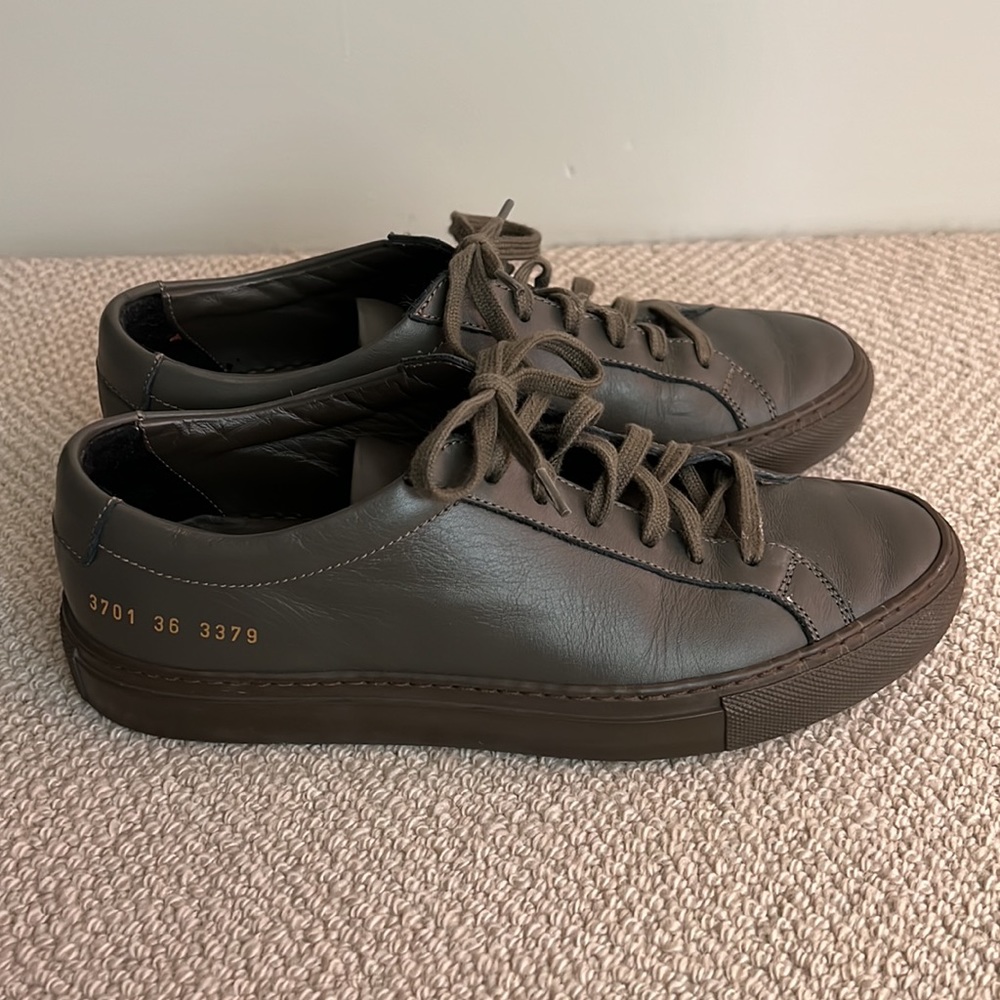 Common Projects dark green tennis shoes